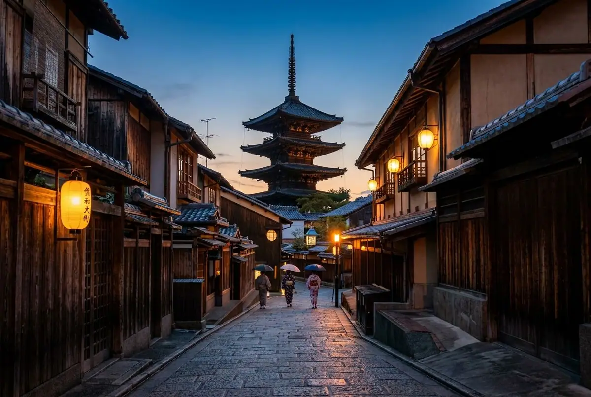 A quiet old street in Kyoto, Japan, with wooden houses and a five-storey pagoda at dusk